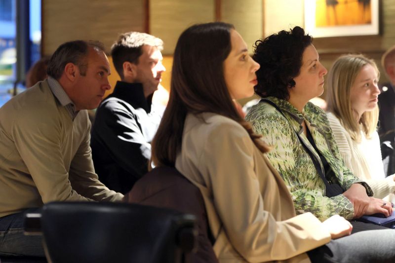 A crowd picture of UU graduates and guests listening to Pete Snodden and Professor Paul Moore 