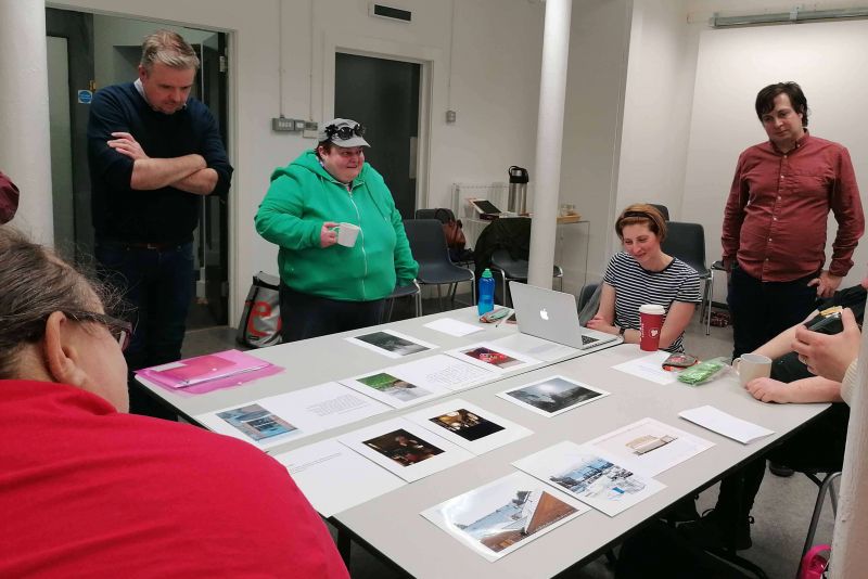 Researchers and Participants reviewing their work