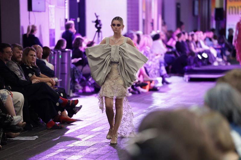Next Generation Fashion Designers showcase their creations on stage in Ulster University Belfast School of Art Graduate Fashion Show 2024 image