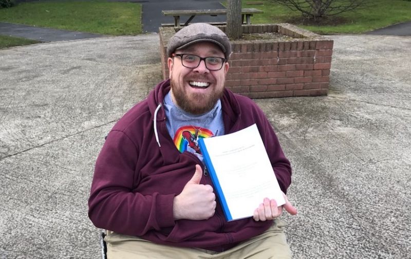 Disability advocate overcomes health issues to graduate with PhD from Ulster University image